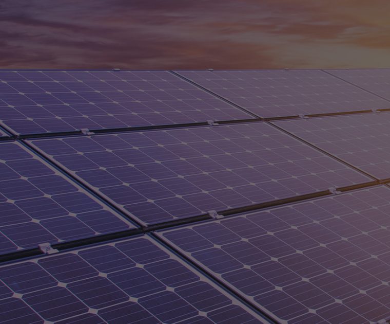 Solar panels capturing sunlight during sunset.